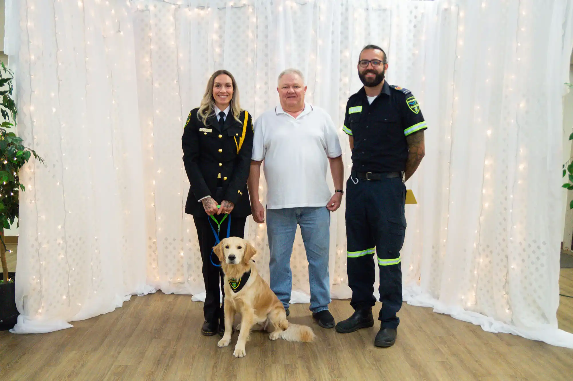 Survivovor Kirk Lewis wiht first responder team 